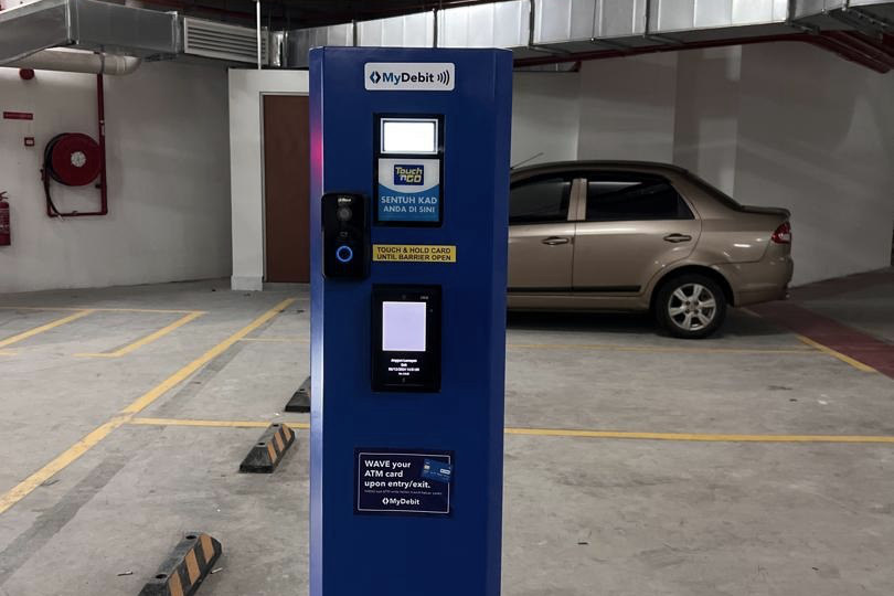 Entry terminal accepting Touch n Go and contactless bank card payment